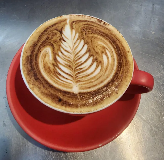 Leaf-pattern latte served at Cafe Ziva